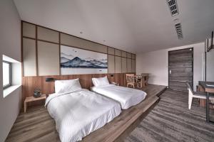 Letto o letti in una camera di Yen Hotspring