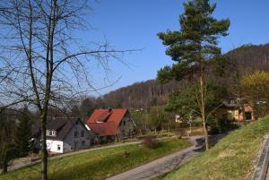 a village with houses and trees on a hill at Ferienhaus Marve in Ettenheim