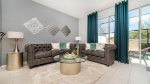 A seating area at 5 Star Townhome on Windsor Hills Resort with Large Private Pool, Orlando Townhome 4922