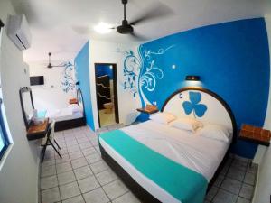 Postel nebo postele na pokoji v ubytování Hotel América