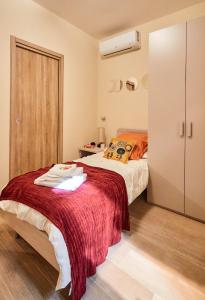 מיטה או מיטות בחדר ב-CASA DEI NONNI - Tresca Vecchia Bari