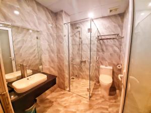 Koupelna v ubytování Rinny Hotel