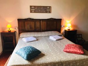A bed or beds in a room at Nel Colle Még 20 kép