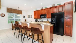 A kitchen or kitchenette at Luxury Contemporary Style Villa on Windsor Hills Resort, Orlando Villa 4812