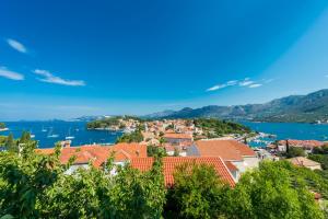 a view of a town on the water with boats at Villa NONA in Cavtat