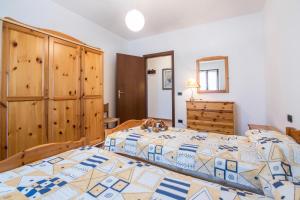 A bed or beds in a room at casa chiara