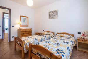A bed or beds in a room at casa chiara