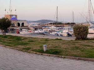 a group of boats docked in a marina at Olbia Tempio in Olbia