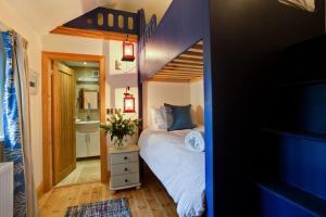 Ένα ή περισσότερα κρεβάτια σε δωμάτιο στο Oyster Catcher