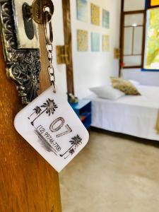 Vila Pequeá Pousada Ilhabela客房内的一张或多张床位