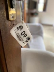 Vila Pequeá Pousada Ilhabela客房内的一张或多张床位