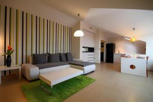 Un lugar para sentarse en Domador Rooms & Apartments