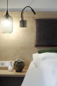 Postel nebo postele na pokoji v ubytování Hotel Starchlhof