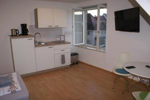 Η κουζίνα ή μικρή κουζίνα στο Apartment 14
