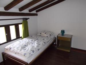 Un pat sau paturi într-o cameră la Casa Bianchi