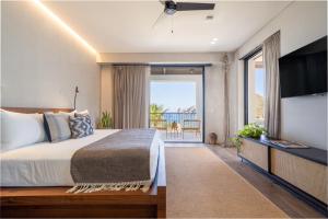Postel nebo postele na pokoji v ubytování 1 Homes Preview Cabo