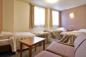 Postel nebo postele na pokoji v ubytování Hotel St. Malte