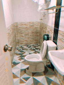 Koupelna v ubytování ริมบึงสวนพริกรีสอร์ท