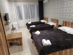 MikePalace客房内的一张或多张床位