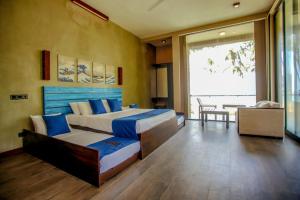 Postel nebo postele na pokoji v ubytování SOLUNA BEACH RESORT + 37 fotografií
