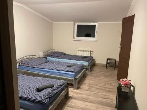 Una cama o camas en una habitación de Europa