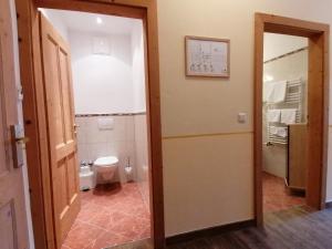 Koupelna v ubytování Hotel Sportalm