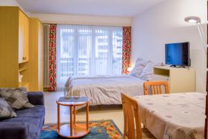 Postel nebo postele na pokoji v ubytování Willkommen-Gemütlich, Balkon, Parkplatz direkt in St Moritz