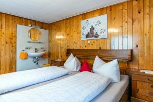 Ένα ή περισσότερα κρεβάτια σε δωμάτιο στο Vroni Höcher