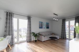 Posezení v ubytování Apartament Skandynawski z balkonem - Dream Apart