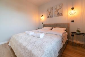 Postel nebo postele na pokoji v ubytování Apartament Skandynawski z balkonem - Dream Apart