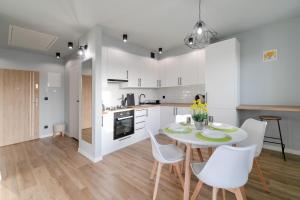 Kuchyň nebo kuchyňský kout v ubytování Apartament Skandynawski z balkonem - Dream Apart