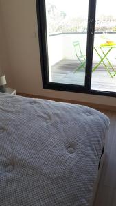 Postel nebo postele na pokoji v ubytování Mimosas + 6 fotografií
