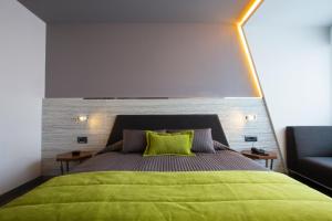 Postel nebo postele na pokoji v ubytování Zeniva Hotel