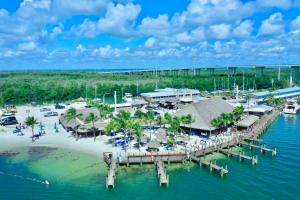 an aerial view of a beach with a dock at Gilbert's Resort & Marina in Key Largo