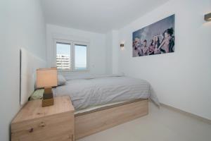 A bed or beds in a room at 213 Luxury Panorama - Alicante Holiday