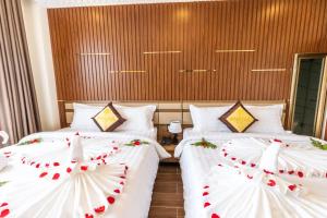 Postel nebo postele na pokoji v ubytování Anasia Hotel