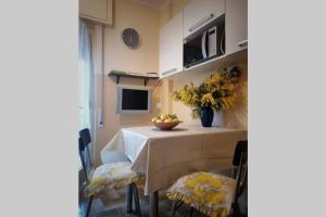 Televízia a/alebo spoločenská miestnosť v ubytovaní Sunset Home