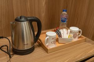Kaffemaskin og/eller vannkoker på Nine Pyramids View Hotel