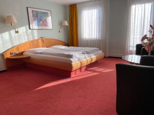 Postel nebo postele na pokoji v ubytování Hotel Kull von Schmidsfelden