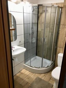 Ванная комната в Holdek Apartamenty Pułaskiego