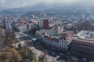 an aerial view of a city with buildings at Apartments Azzurro Sarajevo in Sarajevo