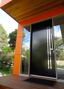 a sliding glass door on a house at The Gallery Accommodation McCrae in McCrae