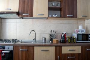 Nhà bếp/bếp nhỏ tại APARTAMENT ALESSI BUȘTENI +7 ảnh