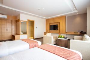 Postel nebo postele na pokoji v ubytování Hotel Da Flamingo