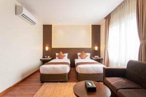 Postel nebo postele na pokoji v ubytování Hotel Da Flamingo