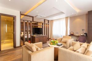 TV a/nebo společenská místnost v ubytování Hotel Da Flamingo