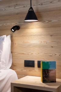 A bed or beds in a room at HOTEL B&B MARILENA