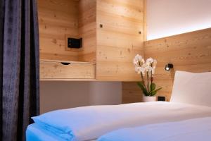 A bed or beds in a room at HOTEL B&B MARILENA