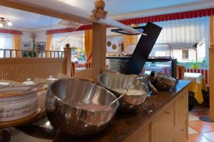 A kitchen or kitchenette at HOTEL B&B MARILENA