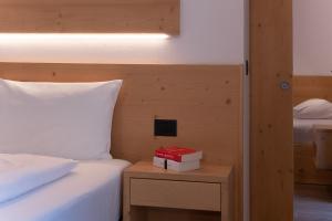 A bed or beds in a room at HOTEL B&B MARILENA